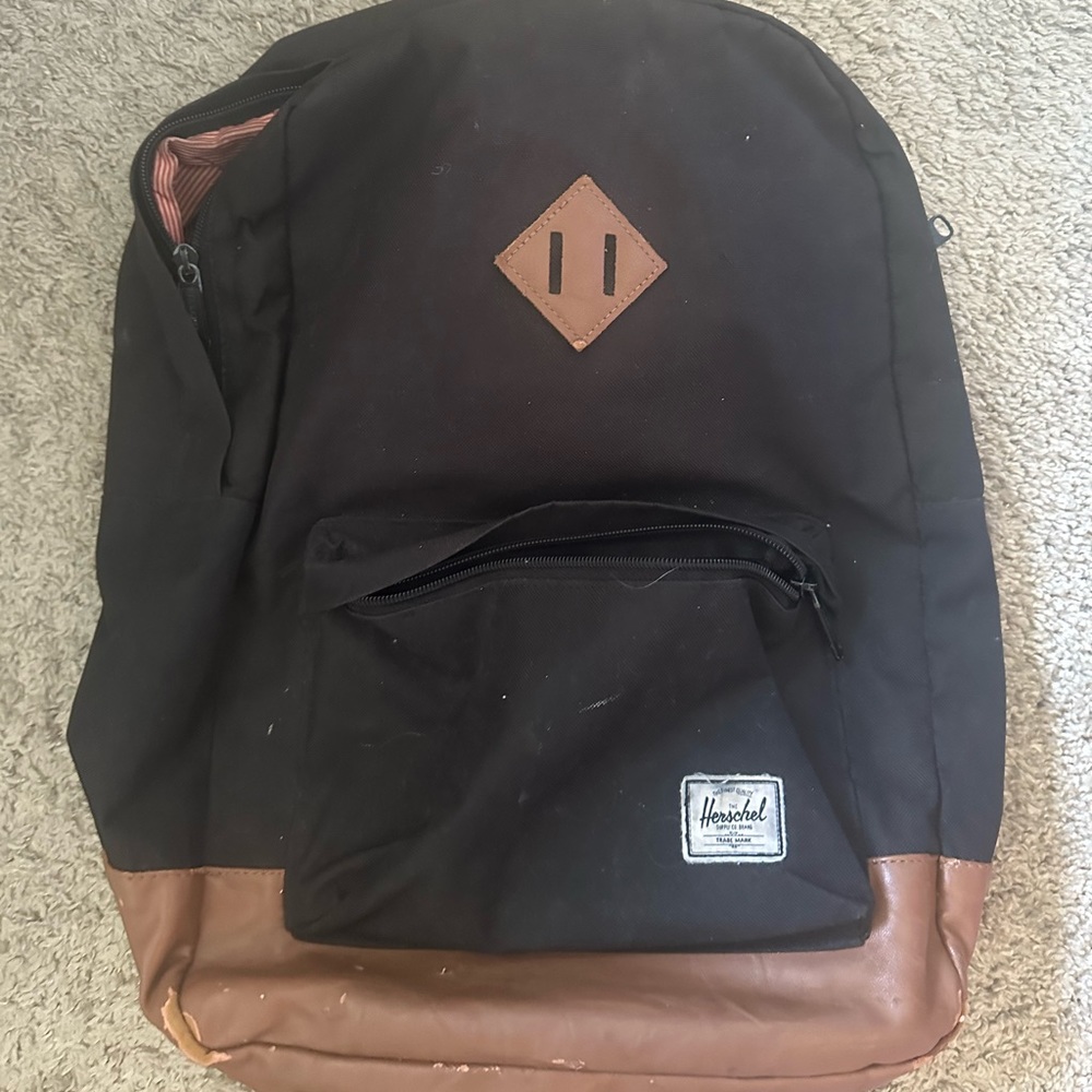 Only sign of wear is at the base on the leather. Otherwise great shape!